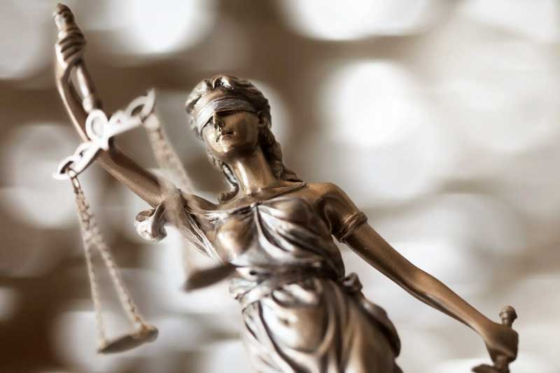 Justicia y representación procesal nacional